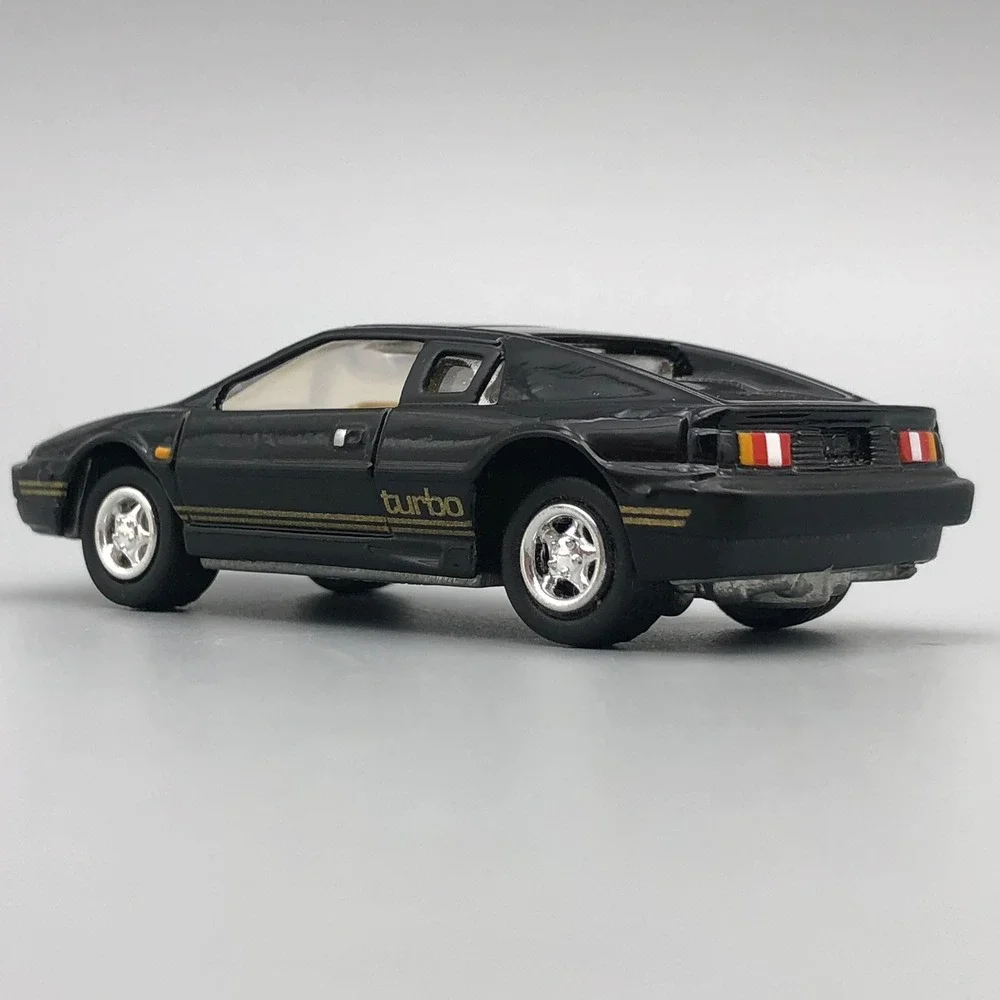 Johnny Lightning 1977 Lotus Esprit Turbo S1 Diecast Car Black Diecast 1/64 Scale